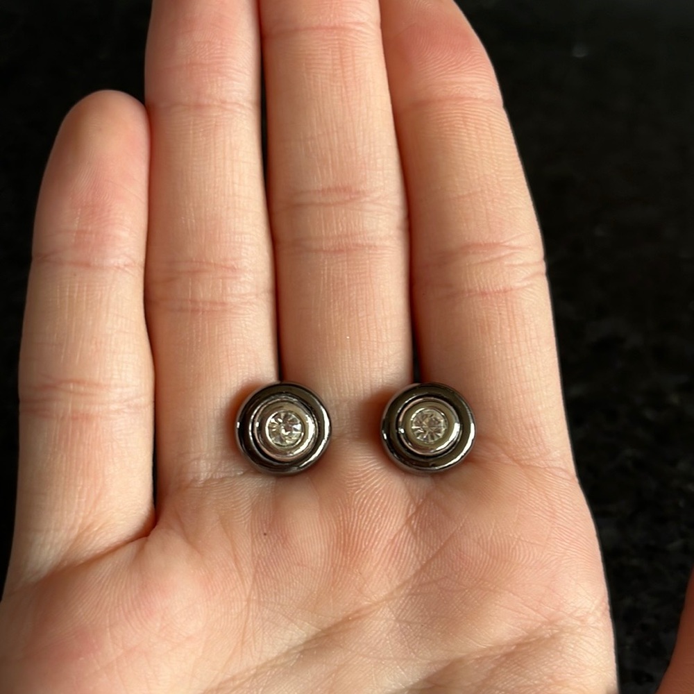 These are stud earrings a very pretty black color and only worn once.